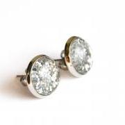 Sparkling silver post earrings with round glass cabochon and glitters